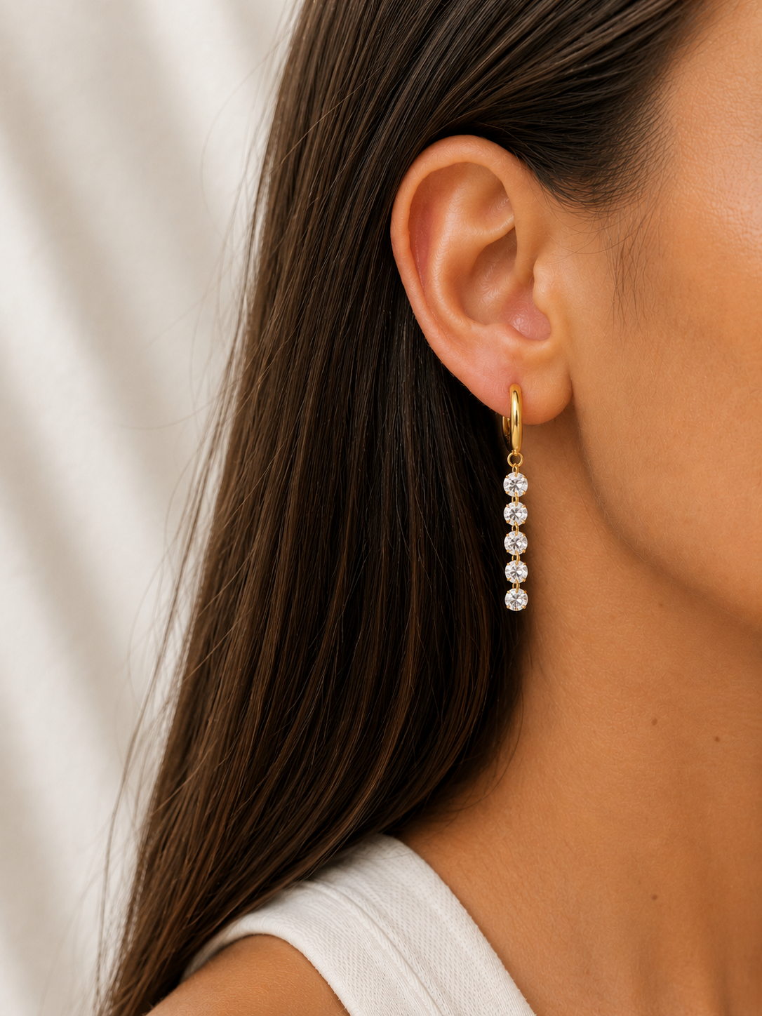 gold floating cz huggie earring 